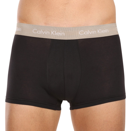 7PACK Calvin Klein miesten bokserit mustat (NB3887A-MEW)