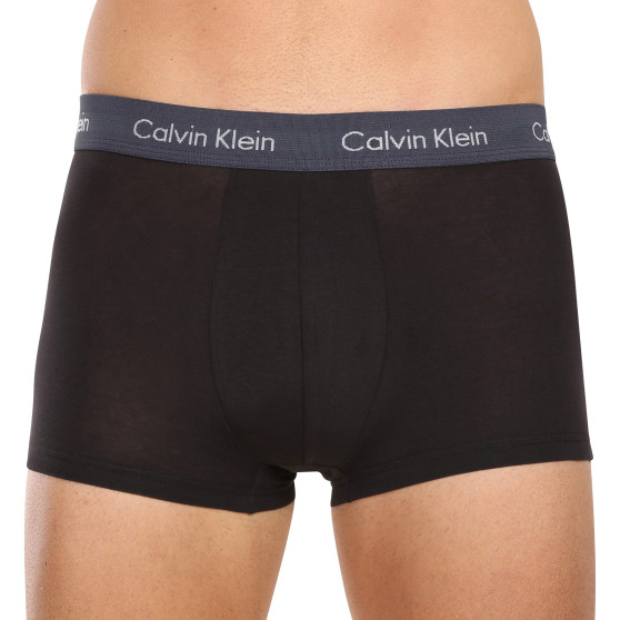 7PACK Calvin Klein miesten bokserit mustat (NB3887A-MEW)