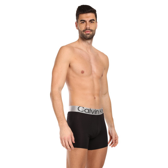 3PACK Calvin Klein miesten bokserit mustat (NB3131A-7V1)