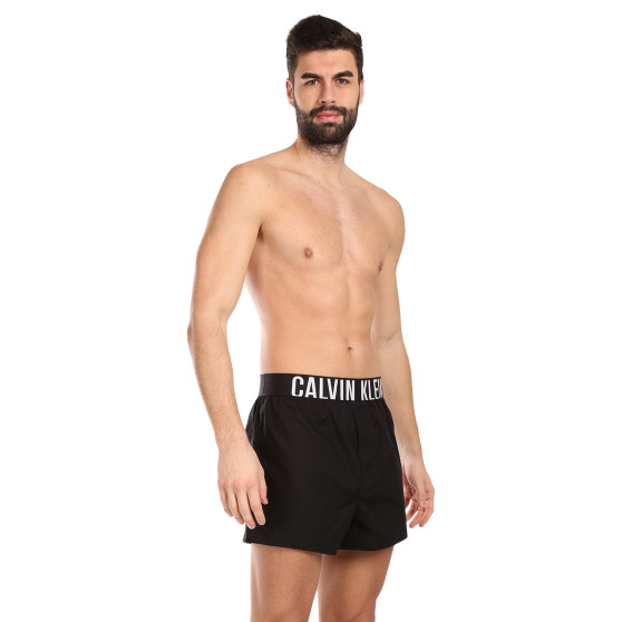 2PACK Calvin Klein miesten bokserishortsit moniväriset (NB3833A-OG4)