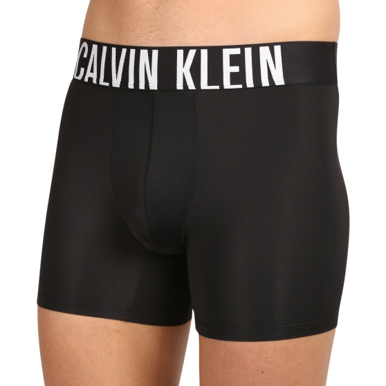 3PACK Calvin Klein miesten bokserit mustat (NB3612A-UB1)