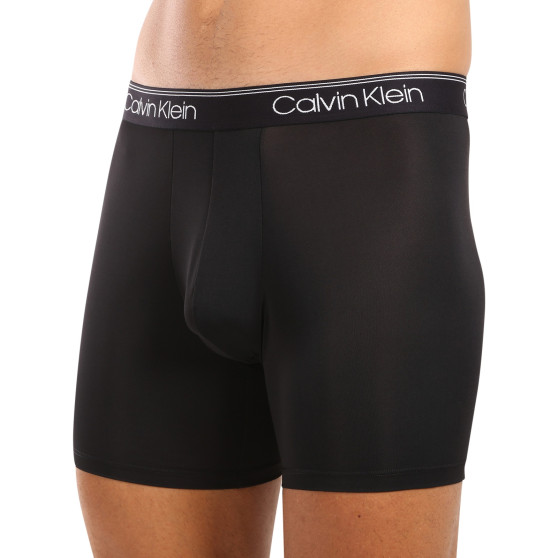 3PACK Calvin Klein miesten bokserit mustat (NB2570A-Q84)