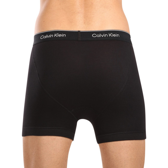 3PACK Calvin Klein miesten bokserit mustat (NB4003A-001)